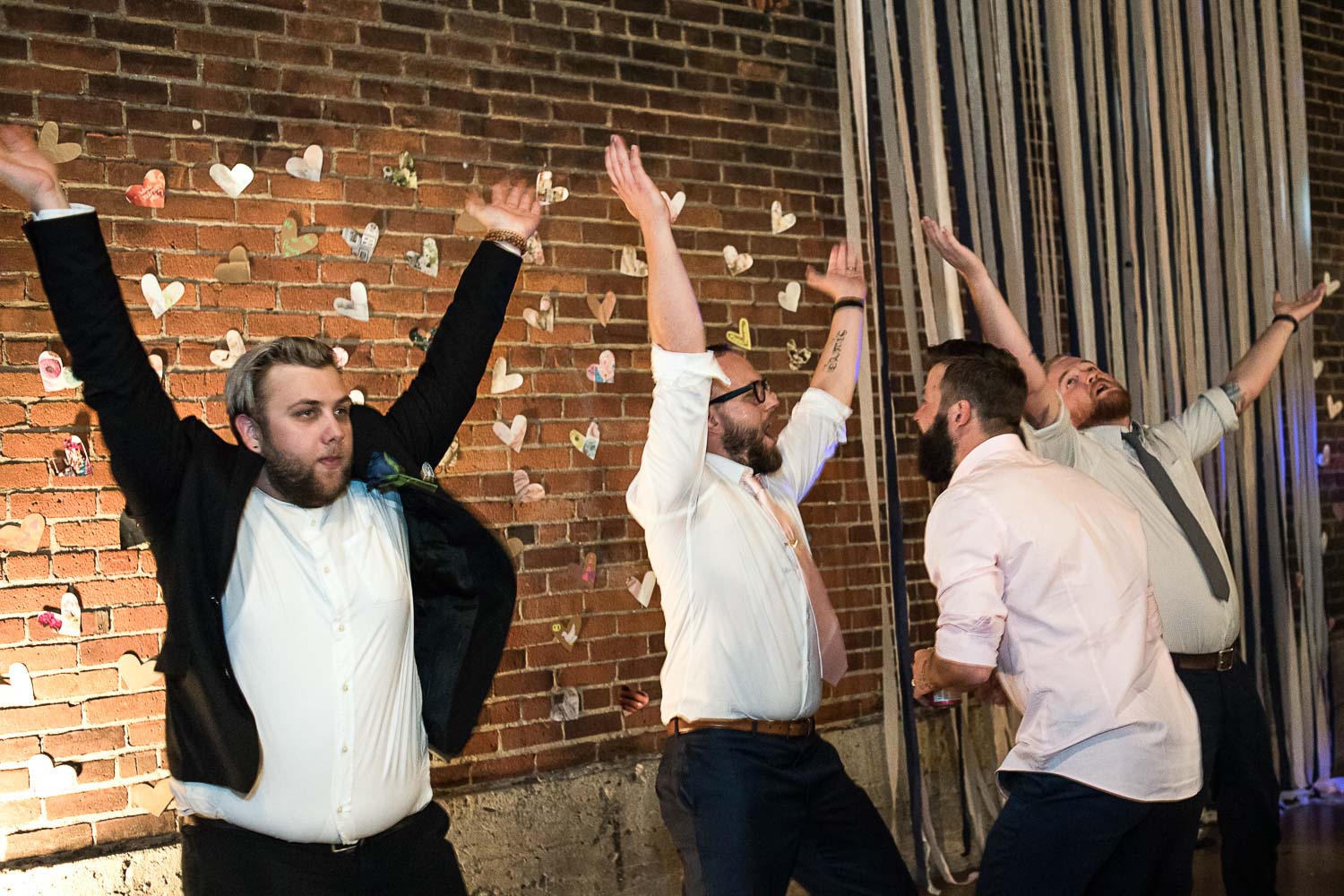 groom and guests dancing to the YMCA