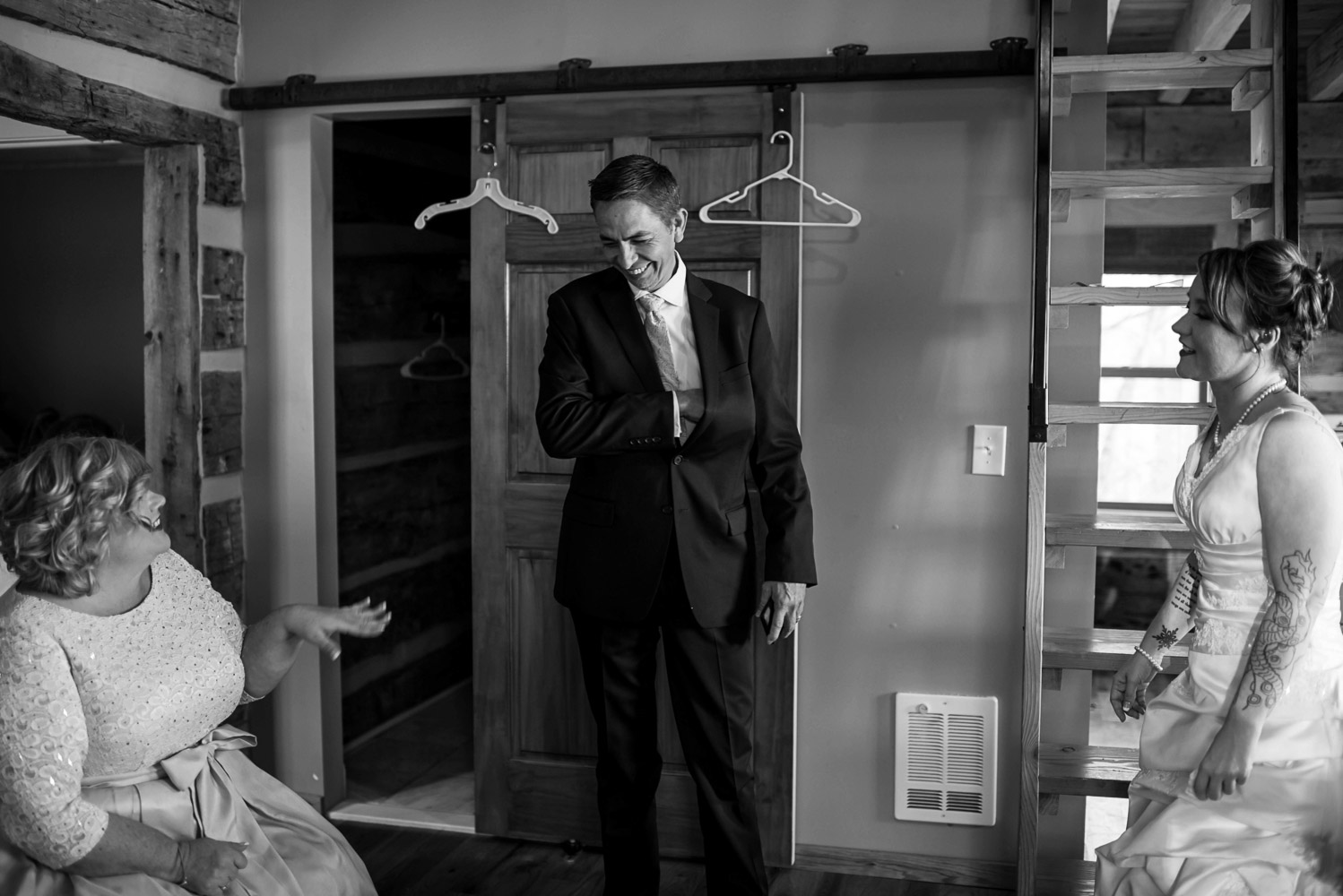 dad seeing bride right before her winter wedding in Minnesota