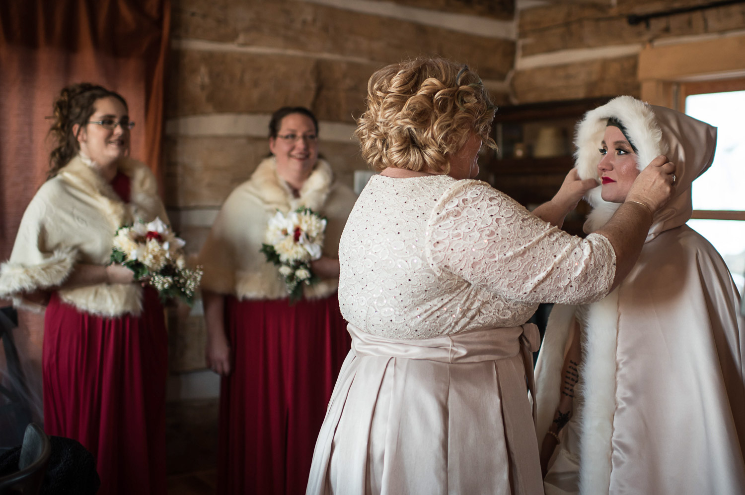 bride getting ready to walk to her ceremony on for her Minnesota winter wedding