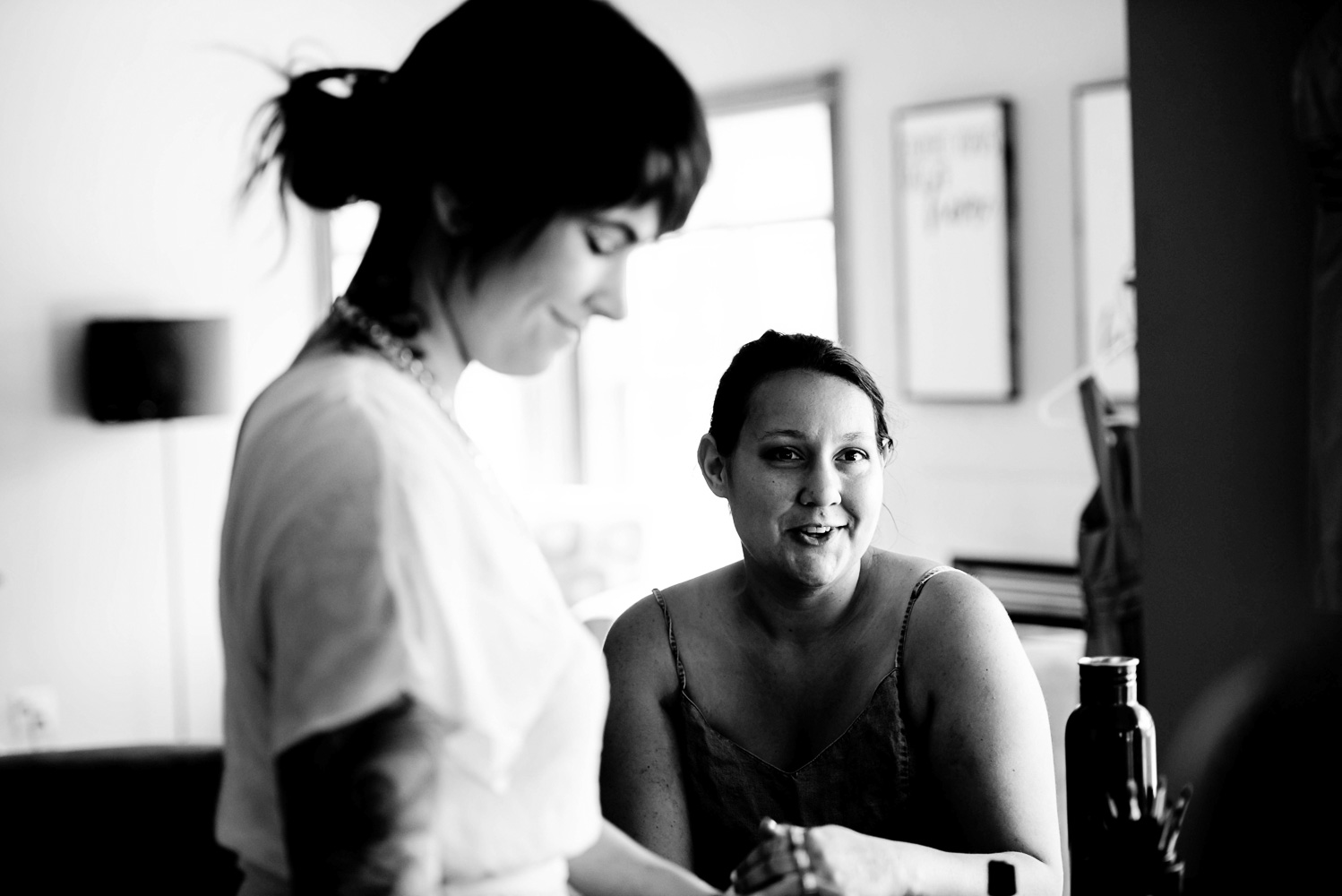 bride and bridesmaids getting ready at home for the summer wedding in Minnesota