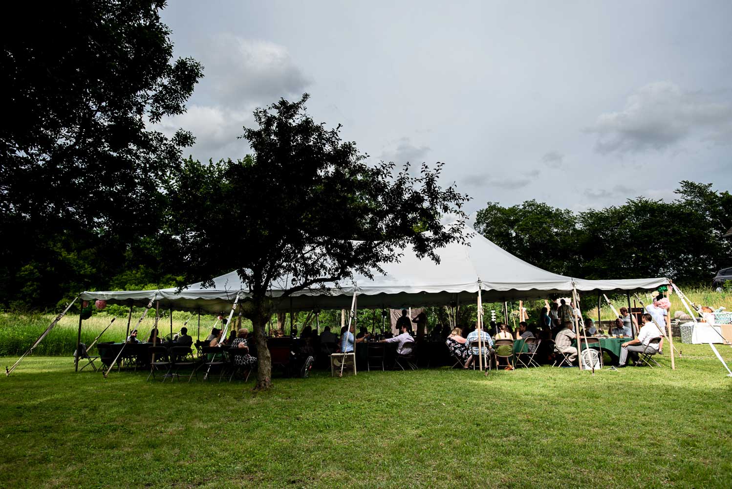 reception set up at their home for their summer wedding