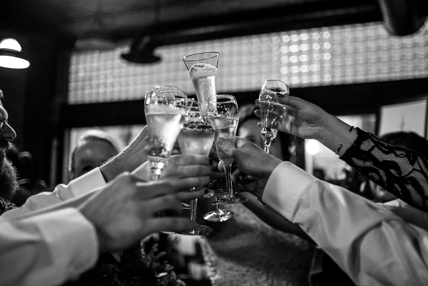 wedding party toasting during the reception at Turtle's in Minnesota