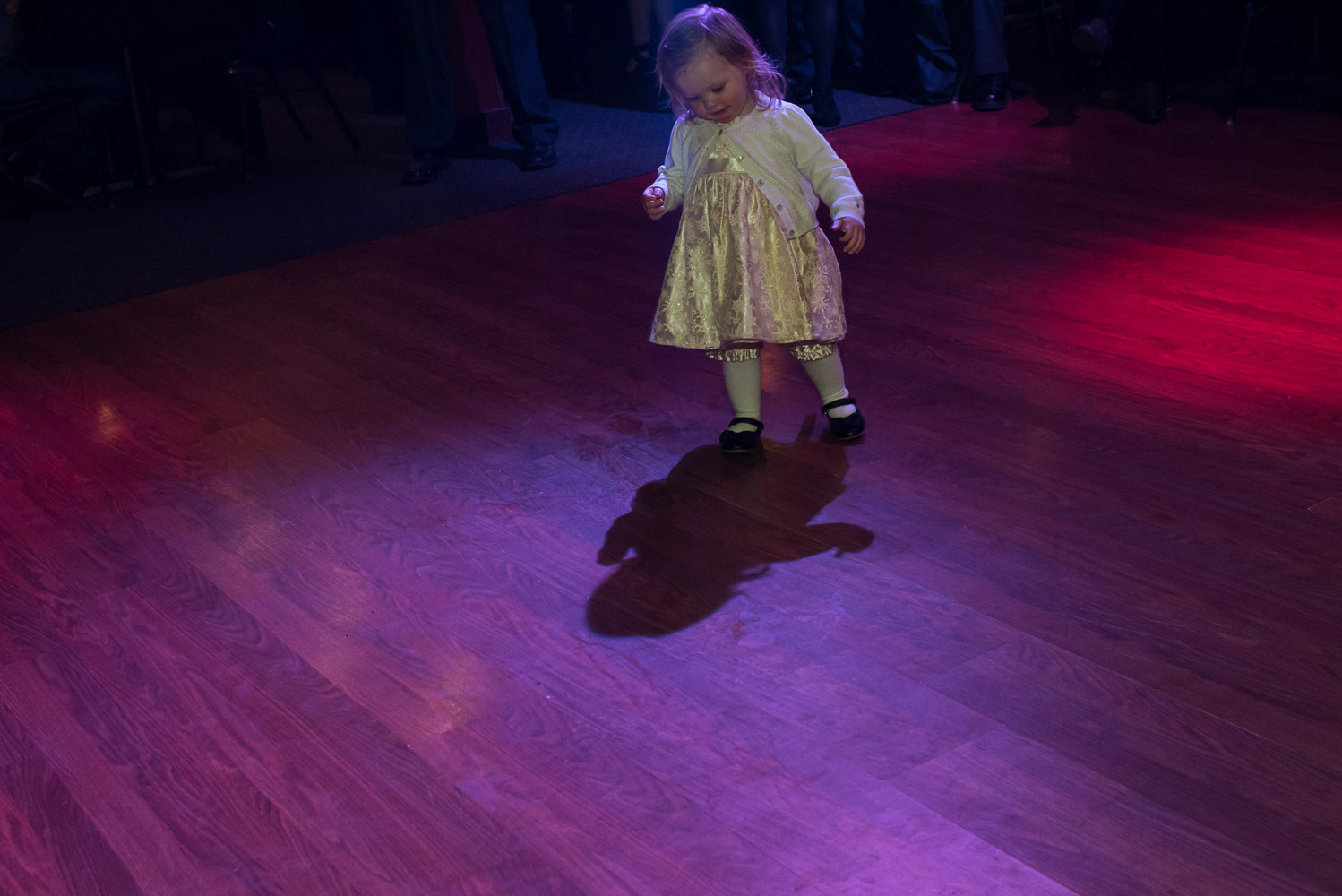 small girl dancing alone at the wedding reception at Turtle's 
