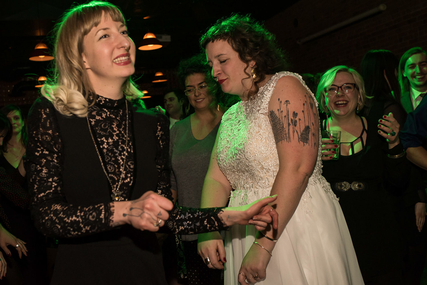 wedding guests dancing with the bride and groom at Turtle's 1890 Social Centre