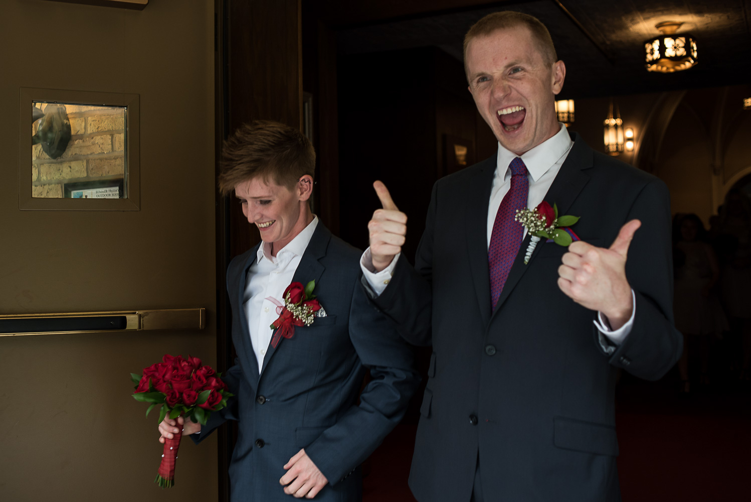 bridesman and groomsman walking out of the church after the wedding ceremony at St. Victoria Catholic Church