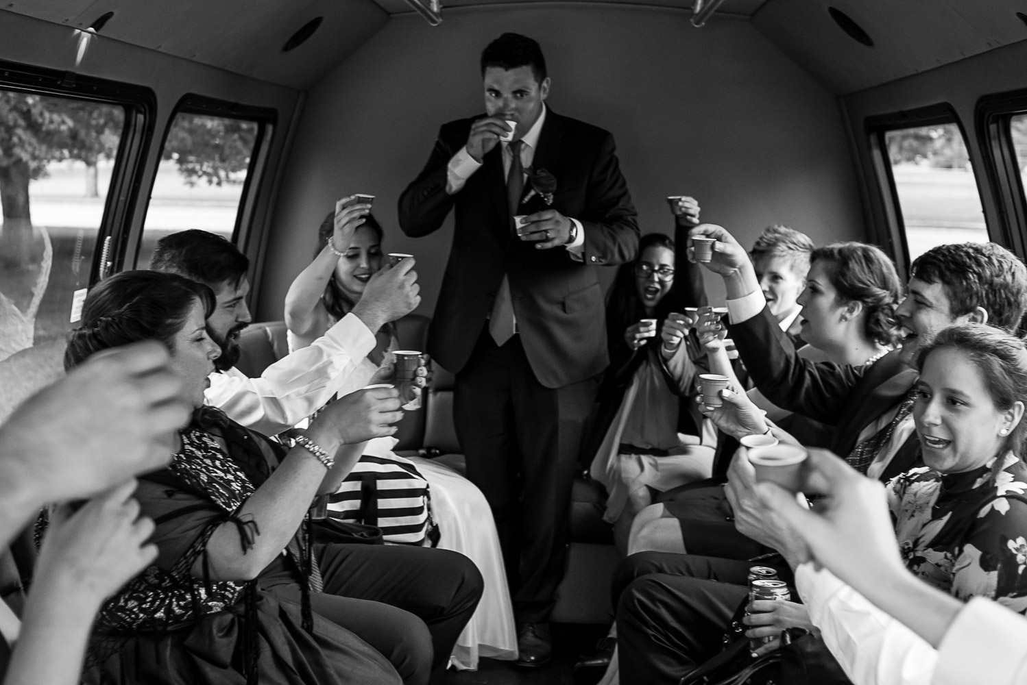 wedding party riding in a shuttle to the wedding reception at the Winery at Sovereign Estate