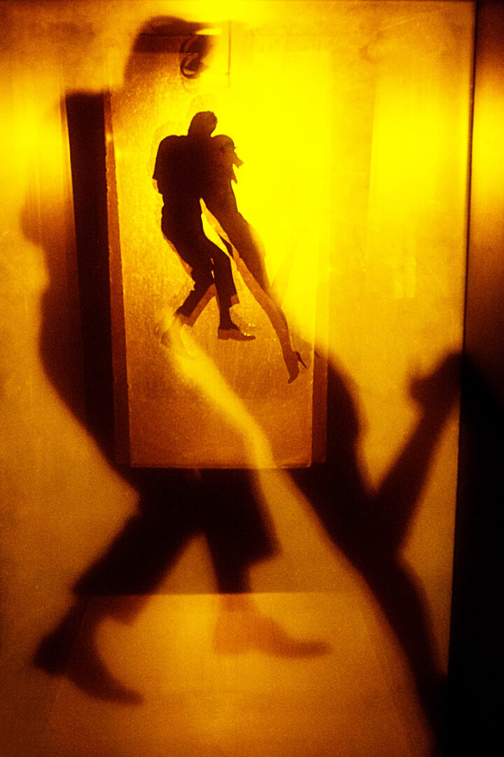 The reflection of a couple dancing together